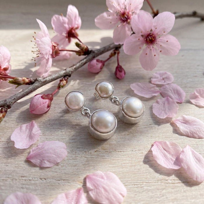 AI lifestyle photo of refined pearl jewelry everyday wear styling