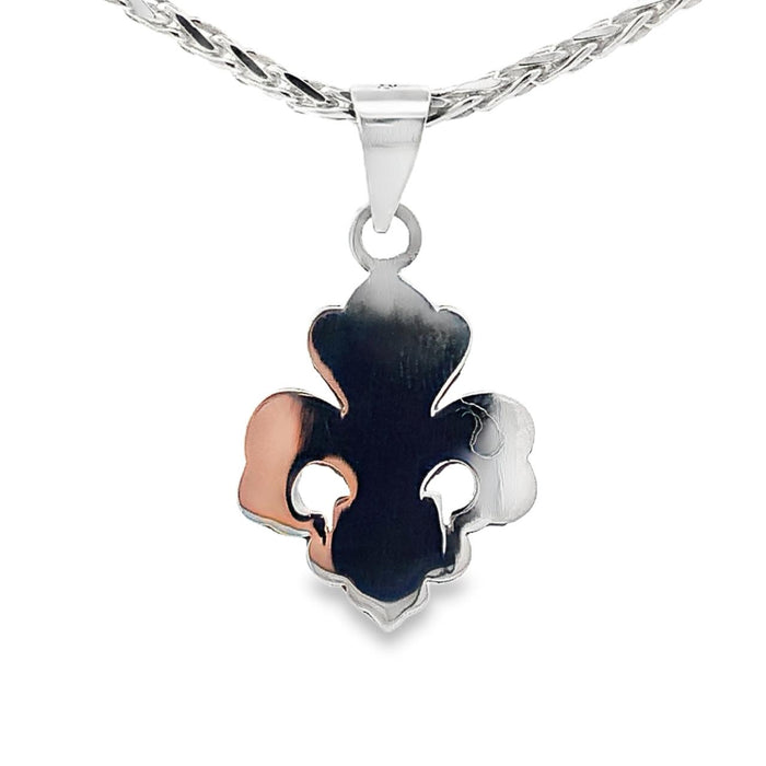 photo of a silver fleur de lis pendant and chain on a white background rear view