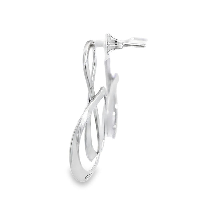 photo of a pair of silver loopy stud earrings on a white background side view