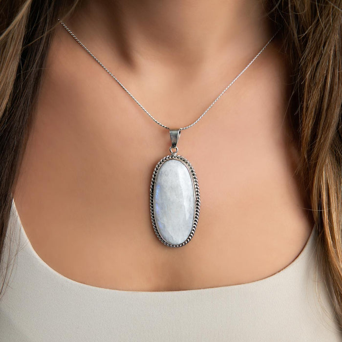 Handcrafted Taxco Artisan White Moonstone Pendant with Twisted Wire Frame