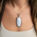 Handcrafted Taxco Artisan White Moonstone Pendant with Twisted Wire Frame