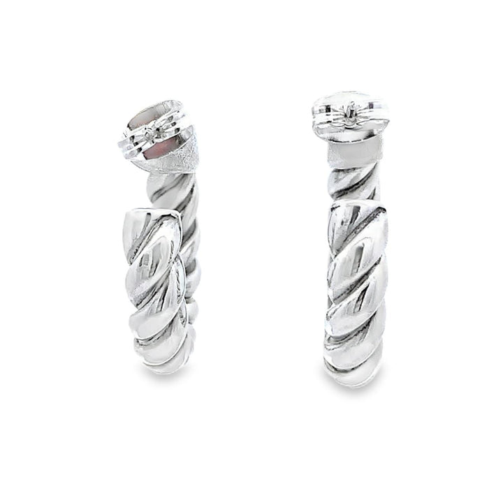 photo of silver twisted hoop earrings on a white background  rear view