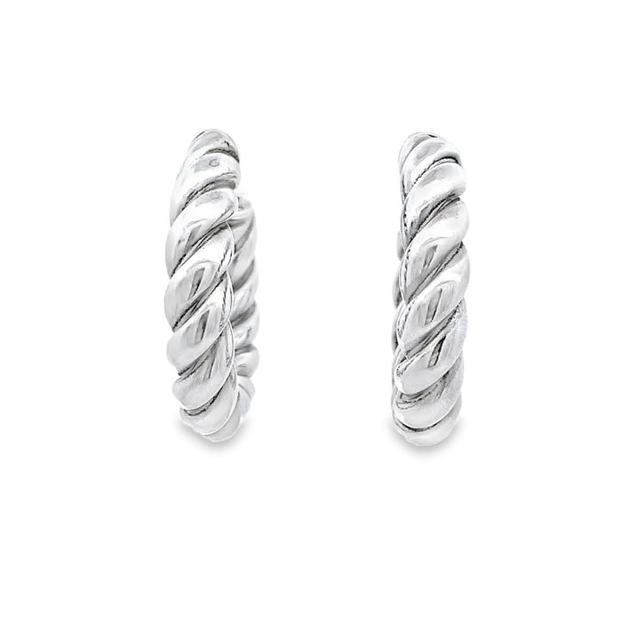 photo of silver twisted hoop earrings on a white background