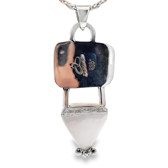 photo of a silver pendant with two bezel set turquoises on a silver chain taken on a white background rear view