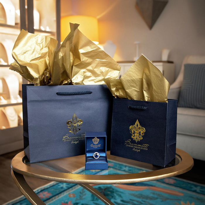 photo of our navy and gold packaging used in our Studio