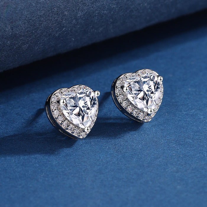 A crystal-heart centerpiece wrapped in a halo of silver sparkle—this set looks like a love note that catches light from every angle. Heartveil Amour Set is made for the soft romantic who wants everyday shine with a forever-kind of glow.