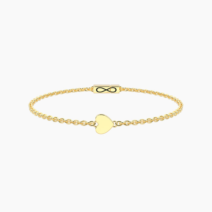 Bracciale Infinity in acciaio dorato con cuore
