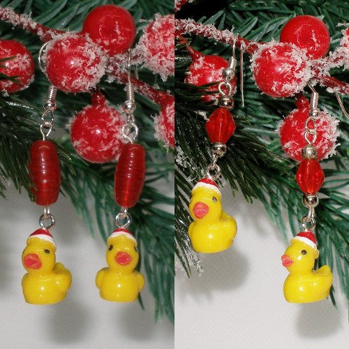 Christmas-themed earrings with red beads and yellow ducks on a green branch background