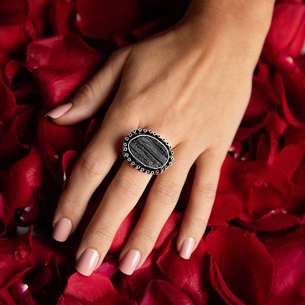 Organic Sterling Silver  Ring- Manuel Figueroa's Black Tourmaline Ring on models hand with red rose background