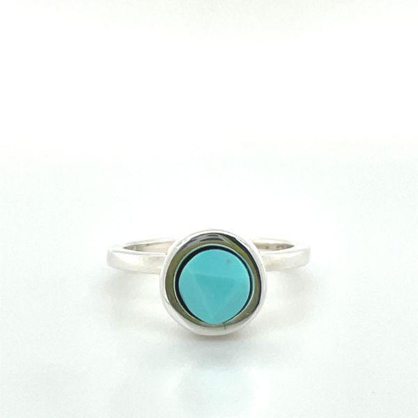 photo of a silver faceted round turquoise ring