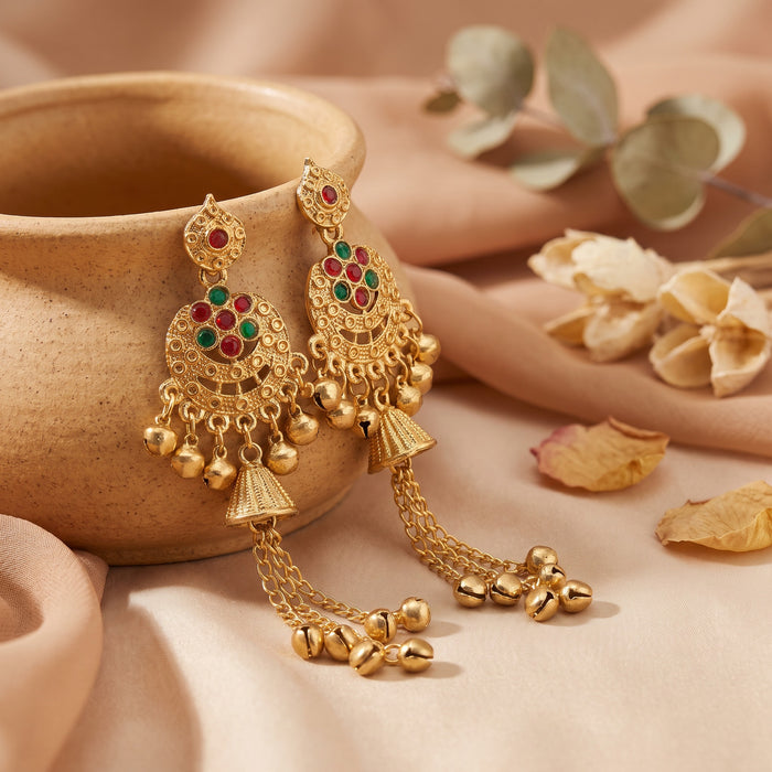 Elegant, festive, and full of graceful detail, the Nayra Gem Jhumka blends traditional charm with a bright jewel-inspired finish. Featuring soft turquoise gem-style accents, intricate golden-tone metalwork, delicate hanging beads, and long chain tassels, these earrings create a beautiful statement that feels rich, feminine, and perfect for special occasions.