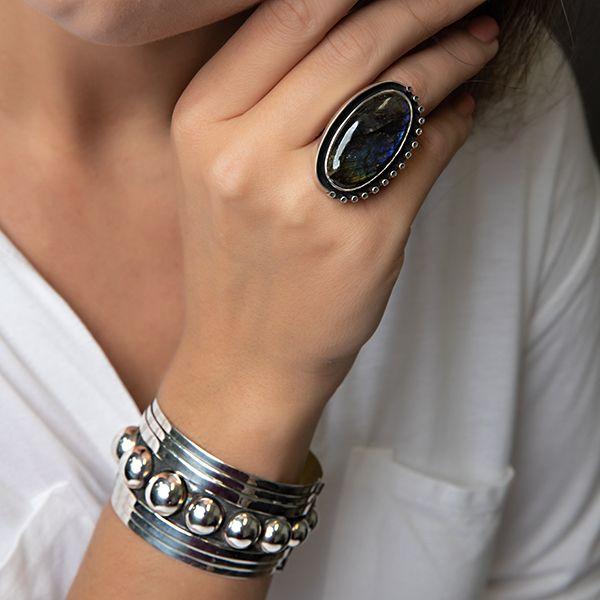 Organic Sterling Silver Ring-Manuel Figueroa Labradorite Ring on models hand with bracelet