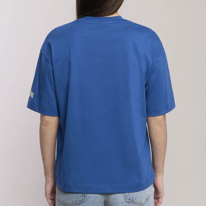 Maglia oversize con scritta "Friends become our chosen family"
