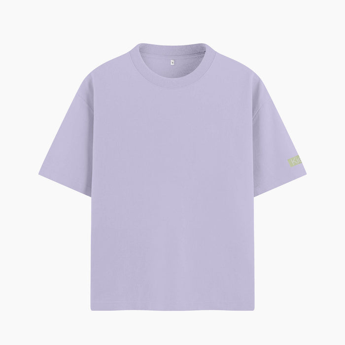 T-shirt oversize con frase: Testa dura cuore folle anima ribelle