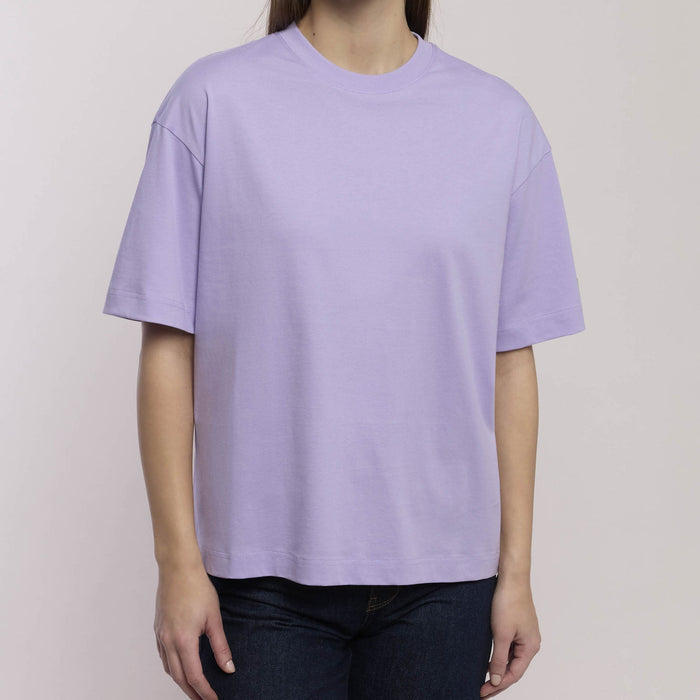 T-shirt oversize con frase: Testa dura cuore folle anima ribelle