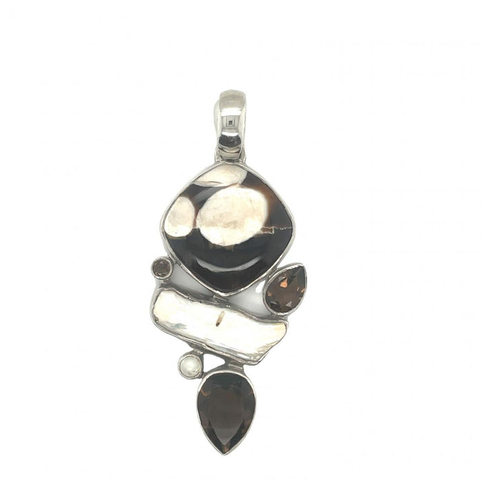 photo of a  six-gem brown and white silver pendant on a white background