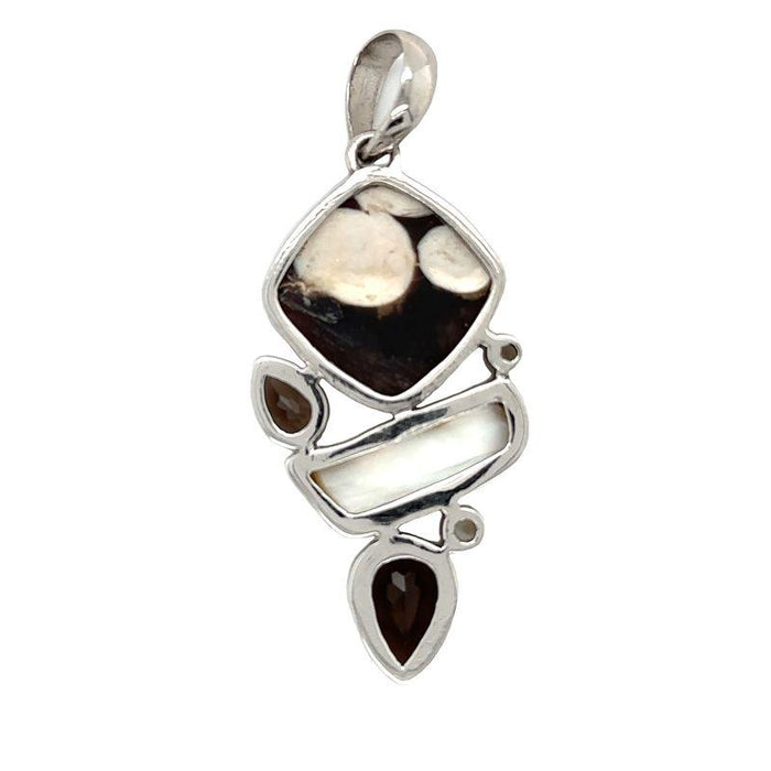 photo of a six-gem brown and white silver pendant on a white background