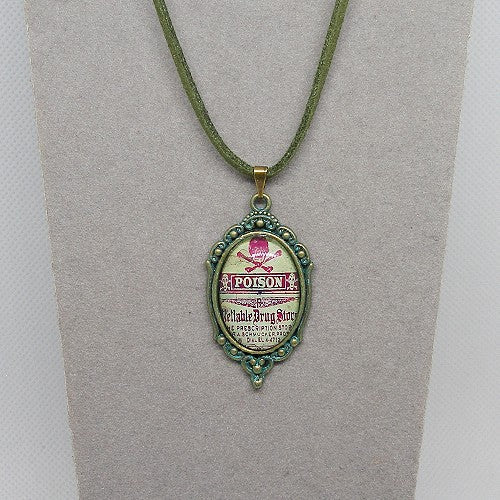 Necklace with a pendant featuring a vintage-style 'Poison' label on a gray background