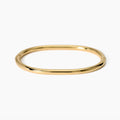 Bracciale rigido in acciaio dorato