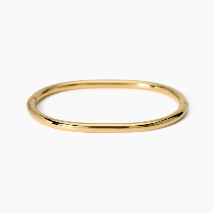 Bracciale rigido in acciaio dorato