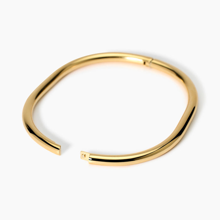 Bracciale rigido in acciaio dorato