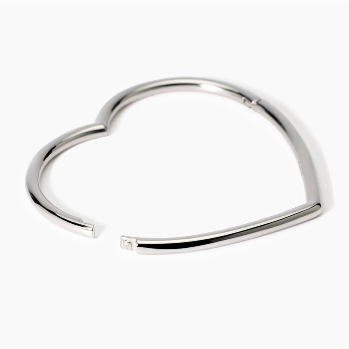 Bracciale rigido a cuore in acciaio