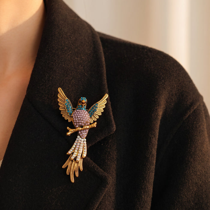 Bold, artistic, and full of character, the Royal Parrot Brooch is a striking statement piece designed to bring charm and personality to any look. Featuring a beautifully detailed parrot silhouette with rich jewel-toned accents, this brooch adds a playful yet elegant touch to outfits, scarves, bags, or gifting collections. Its vibrant design makes it perfect for anyone who loves standout accessories with a regal feel.