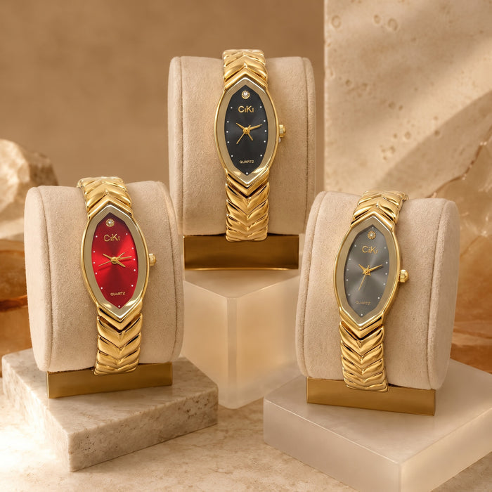 Elegant, polished, and beautifully feminine, the Royal Petal Watch is made for someone who loves graceful timepieces with a regal jewelry-inspired touch. Designed with a slender petal-shaped dial, sparkling crystal accent, and sculpted golden bracelet links, this watch brings a luxurious glow that feels perfect for everyday styling, office wear, special occasions, or thoughtful gifting.