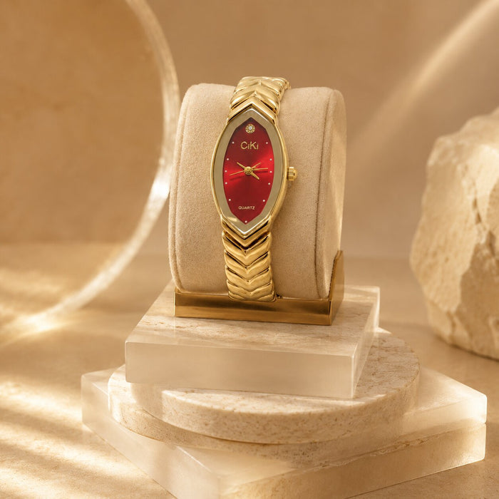 Elegant, polished, and beautifully feminine, the Royal Petal Watch is made for someone who loves graceful timepieces with a regal jewelry-inspired touch. Designed with a slender petal-shaped dial, sparkling crystal accent, and sculpted golden bracelet links, this watch brings a luxurious glow that feels perfect for everyday styling, office wear, special occasions, or thoughtful gifting.