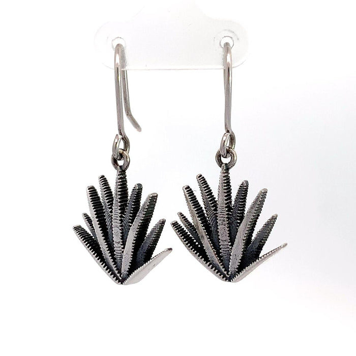 photo of a silver pair of agave-themed drop silver earrings