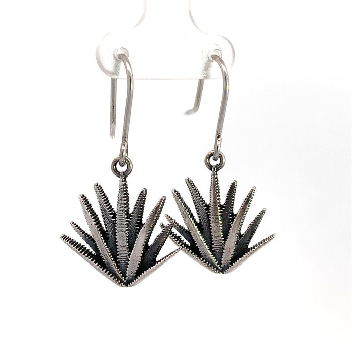 photo of a silver pair of agave-themed drop silver earrings