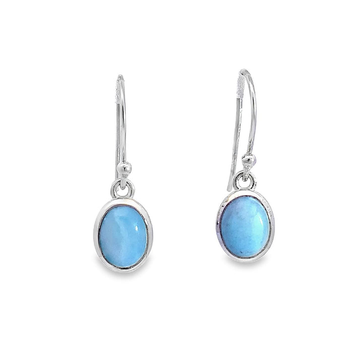 Photo of a silver earring set with oval cabochon blue Larimar on a white background