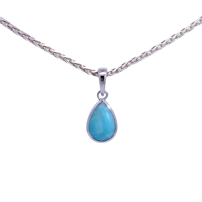 photo of a river pear-shaped blue Larimar pendant necklace on a white background