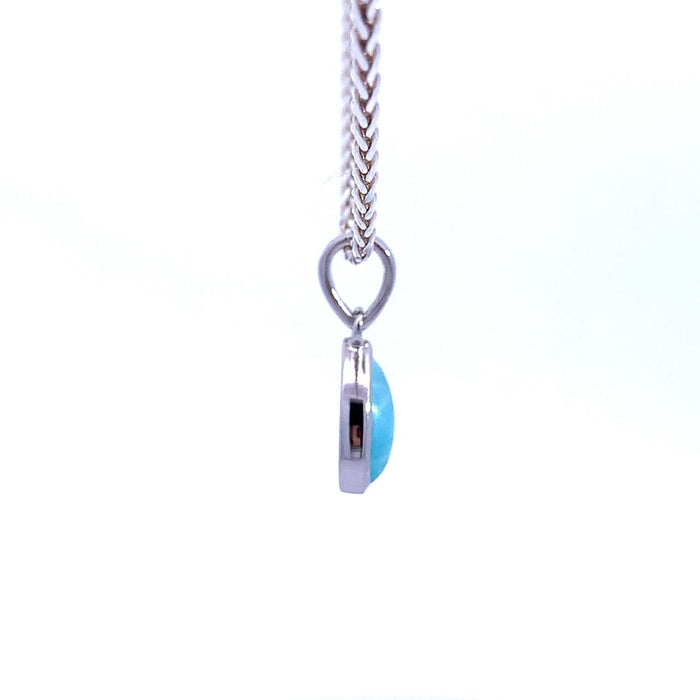 photo of a river pear-shaped blue Larimar pendant necklace on a white background side view