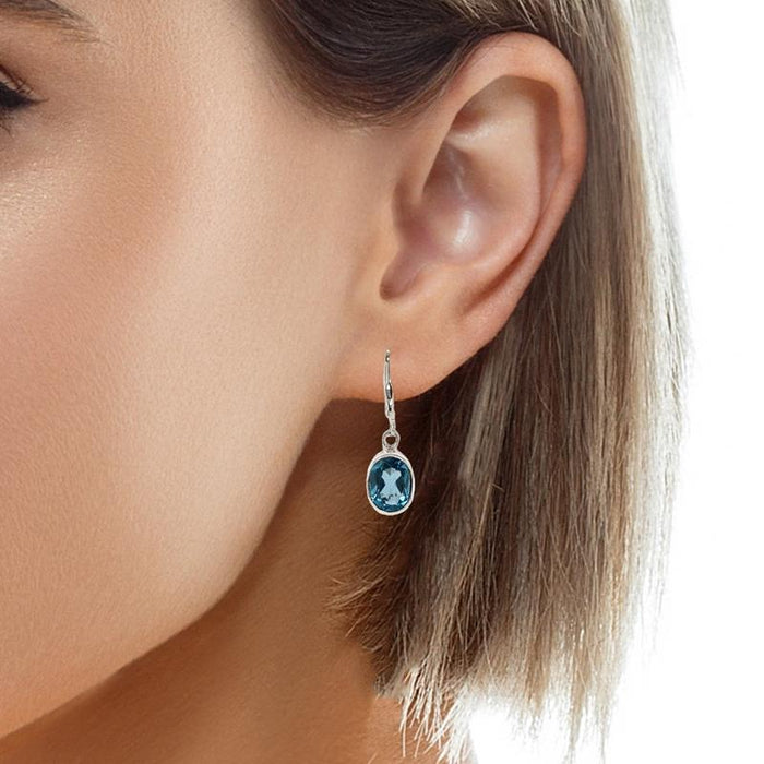 Sterling Silver Blue Topaz Earrings-Artisan Guilleas Joyas Oval Dangle Earrings