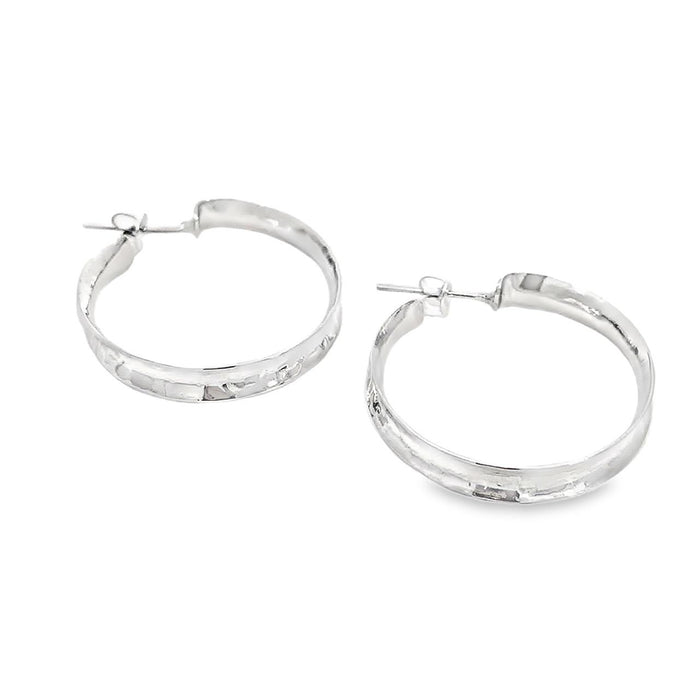 Taxco sterling silver concave hammered hoop earrings with textured artisan finish and post clutch backing