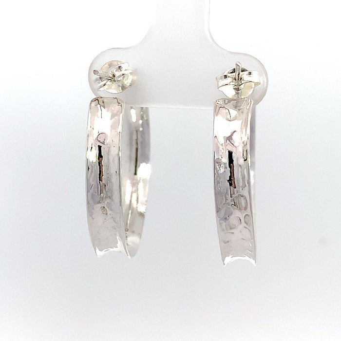 Taxco sterling silver concave hammered hoop earrings with textured artisan finish and post clutch backing rear view