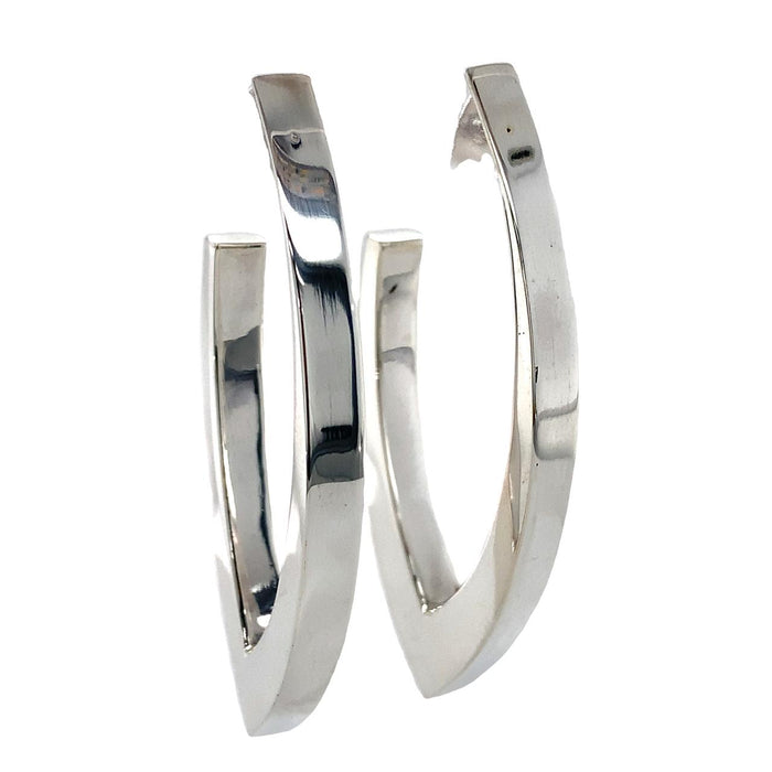 photo of a pair of silver v-shaped hoop earrings front view on a white background
