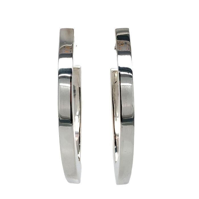 photo of a pair of silver v-shaped hoop earrings front view on a white background