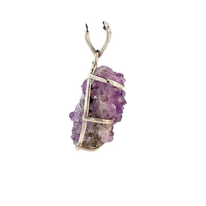 photo of a sterling silver amethyst druzy pendant on a white background side view