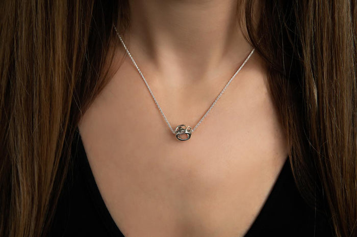 Sterling Silver Pendant Necklace-Guillermo Arreguis' Honeycomb Ball on 18 Inch Cable Chain on model