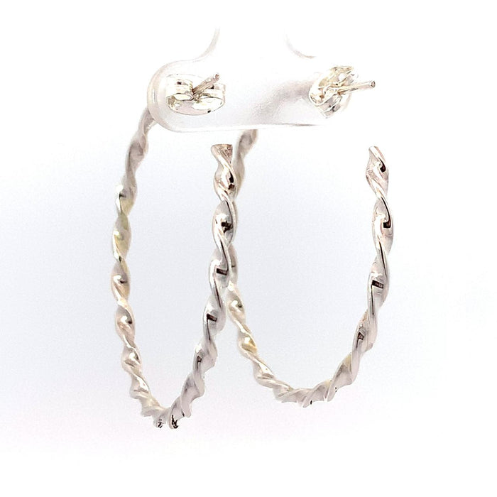 photo of  a twisted silver hoop earring