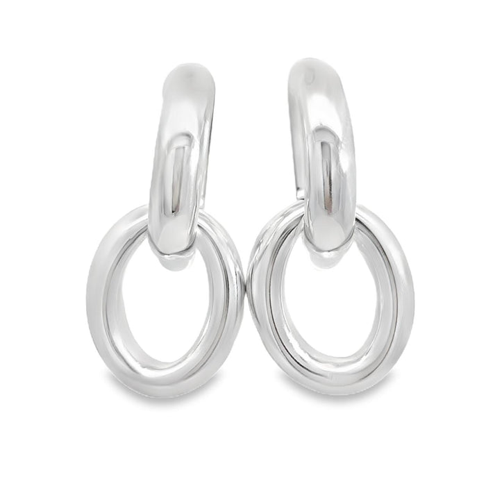 photo of a pair of large silver two-part doorknocker earrings on a white background