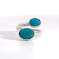 Sterling Silver Ring- Artisan Duo Bezel Turquoise Bypass Ring on white background