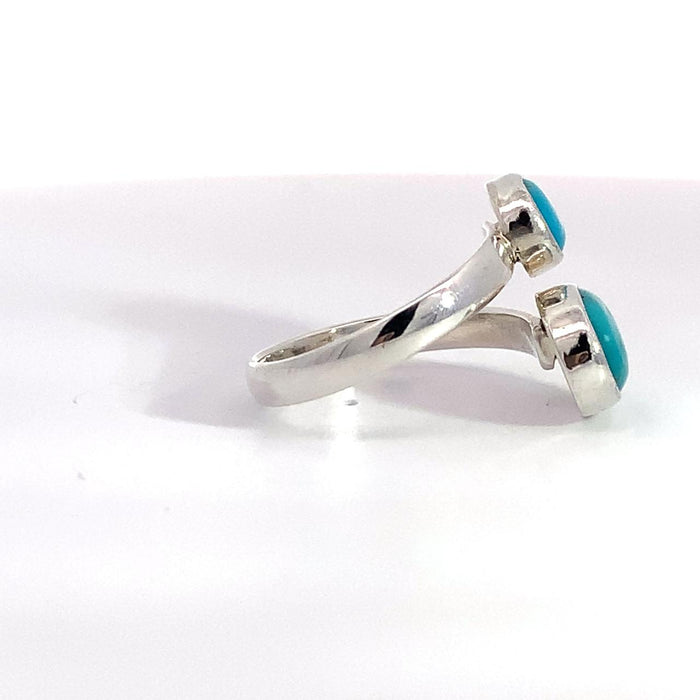 Sterling Silver Ring- Artisan Duo Bezel Turquoise Bypass Ring on white background side view