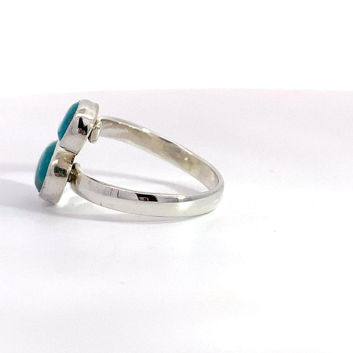 Sterling Silver Ring- Artisan Duo Bezel Turquoise Bypass Ring on white background side view