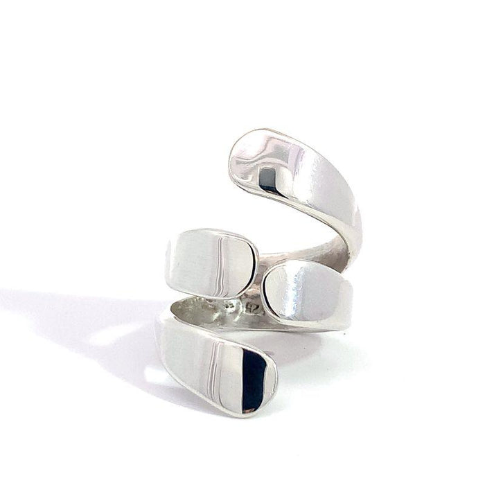 photo of a modern silver ring on a white background