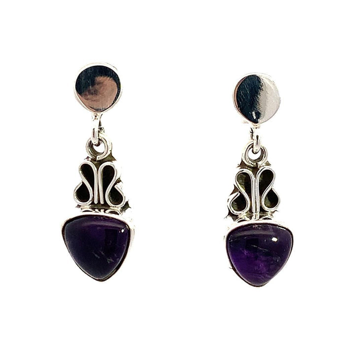 photo of a silver drop earring with a trillion cabochon amethyst bottom on a white background