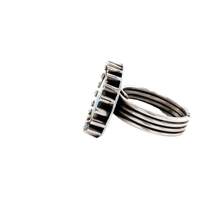Sterling Silver Turquoise Ring- Manuel Figueroa's Turquoise Ring white background sideview