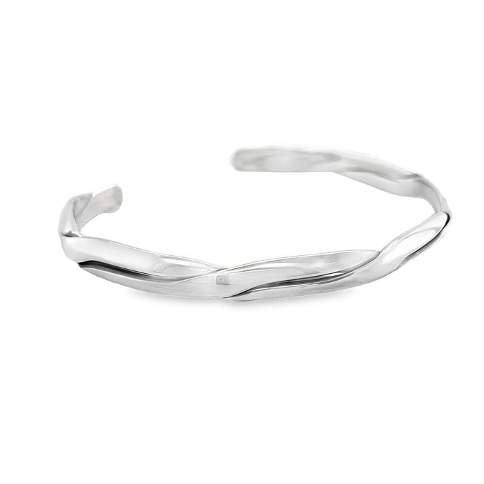 photo of a silver cuff on a white background